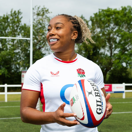 Sadia Kabeya wearing an opro mouthguard holding a rugby ball